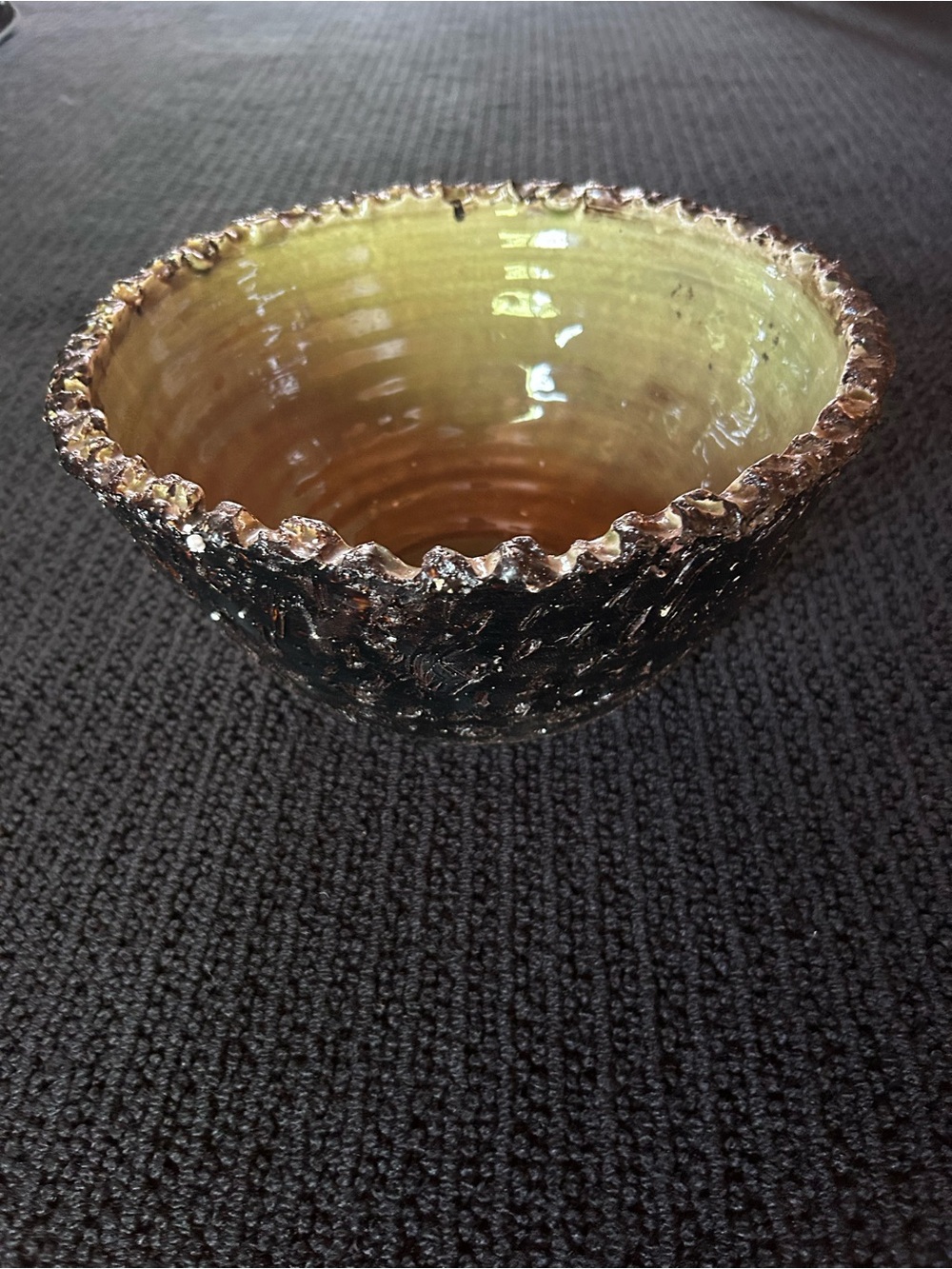 Organic Ceramic Bowl with Green Interior and Textured Black Exterior